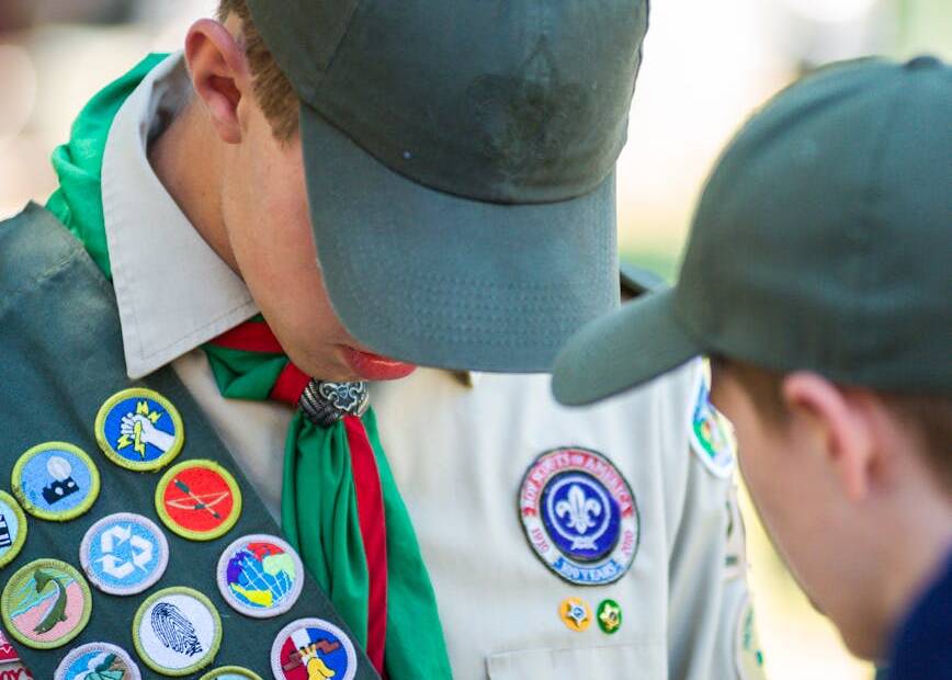 a boy scout wearing his uniform